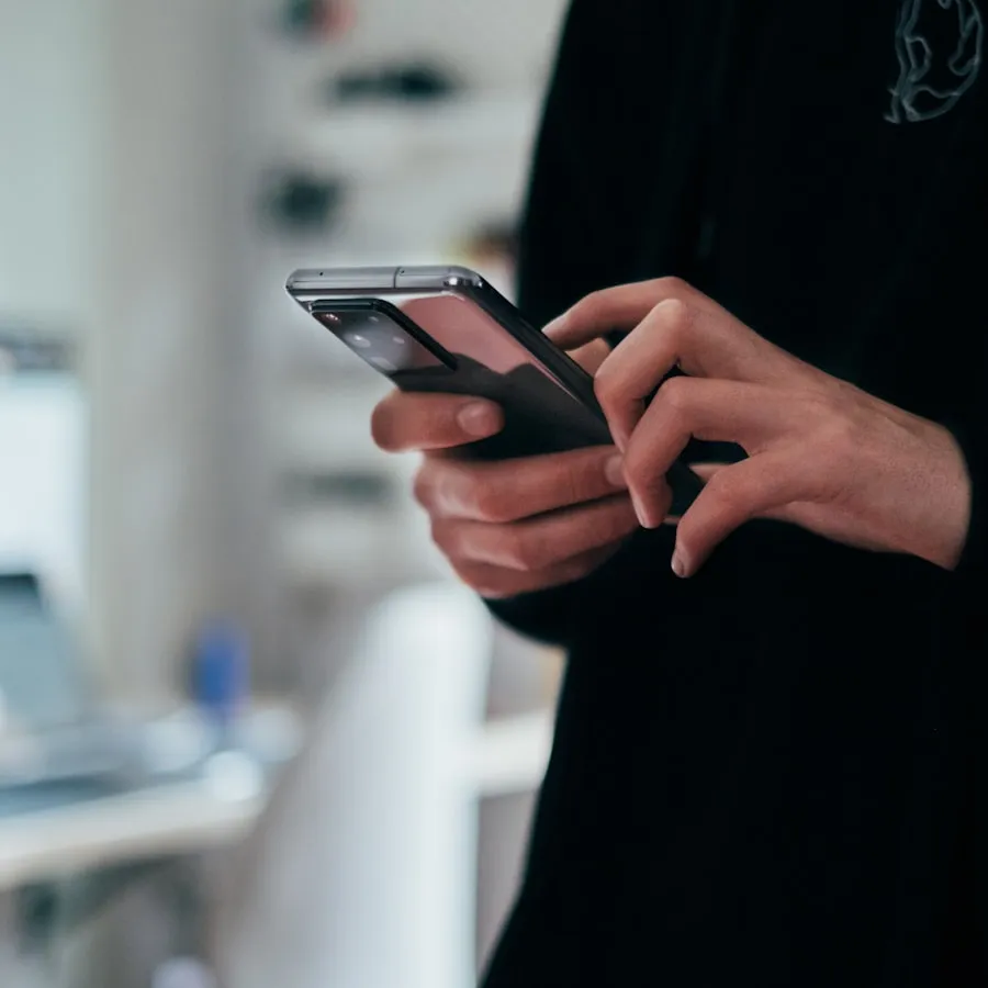 Hands holding an iPhone